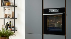 Einbauküche culineo® aus Holz in Schwarz Culineo® Einbauküche C357 mit XTRA CERAMIC Arbeitsplatte Mattschwarz - zweizeilig