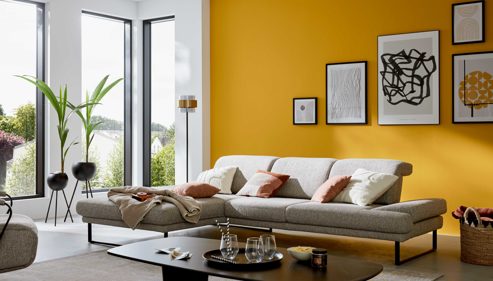 Ecksofa Interliving aus Stoff in Hellgrau Interliving Sofa Serie 4460 - Ecksofa silbergrauer Webstoff Jazz 121 & schwarze Metallfüße - Stellfläche ca. 191 x 308 cm