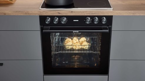 Einbauküche culineo® aus Holz in Dunkelgrau Culineo® Einbauküche C357 mit gorenje Einbaugeräten Schiefergrau & Schwarzglas - zweizeilig
